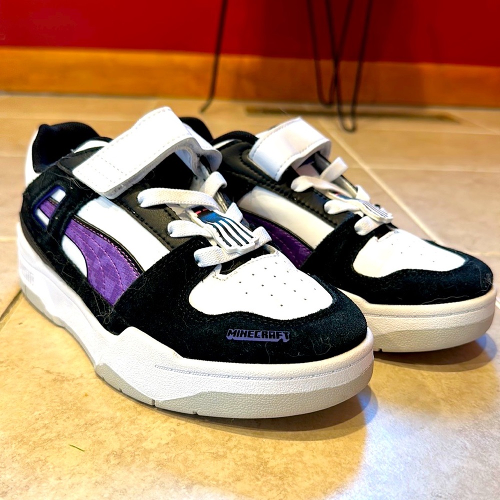 Worn only once! Basically bran new. Purple, Black and White. Minecraft accents.